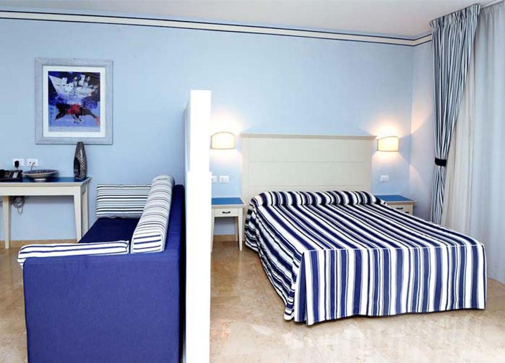 Camera Quadrupla Superior